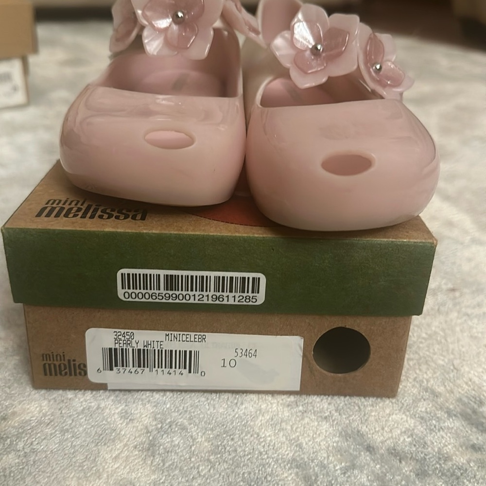 Mini Melissa light used size 10